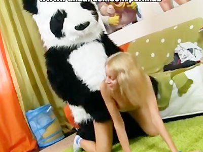 Sexy girl having fun with her panda bear